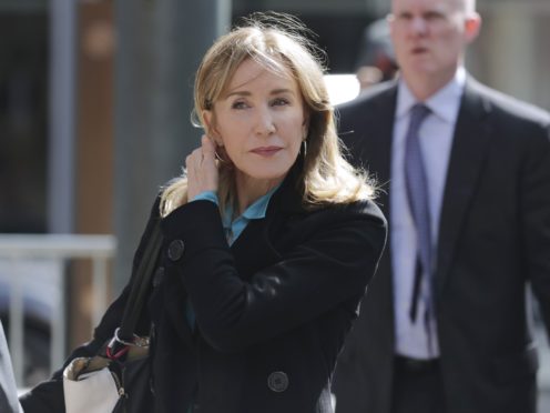 Netflix has postponed the release of a film starring Felicity Huffman (Charles Krupa/AP)