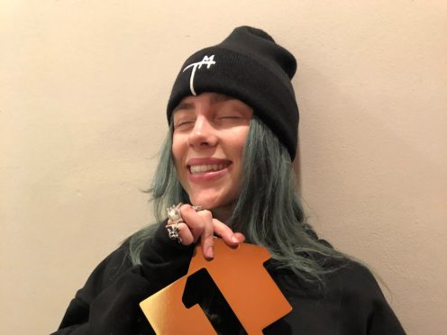 Billie Eilish celebrates after her debut album hit the top of the UK chart (OfficialCharts.com/PA)