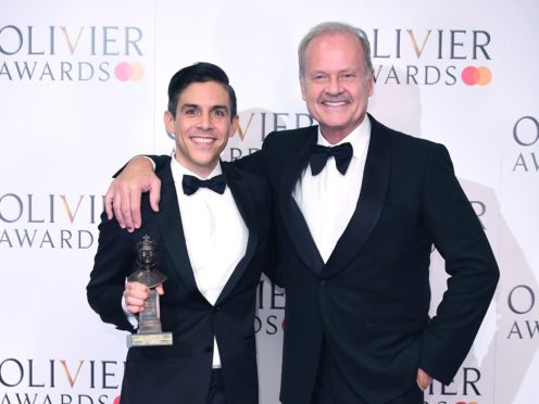 Matthew Lopez with the American Airlines Best New Play award for the Inheritance, presented by Kelsey Grammer (Ian West/PA)