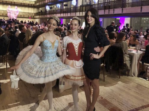 Choreographer Melanie Hamrick poses with dancers at the gala of Youth America Grand Prix, the world’s largest ballet scholarship competition, after the US premiere of her new ballet Porte Rouge (Red Door), based on classic Rolling Stones tunes arranged by her partner, Mick Jagger (Jocelyn Noveck/AP)