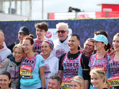 Chris Evans (centre) with the Team Barbara’s Revolutionaries Jake Wood, Emma Barton, Kellie Shirley, Tanya Franks, Scott Mitchell and Natalie Cassidy prior to the 2019 Virgin Money London Marathon (Steven Paston/PA)