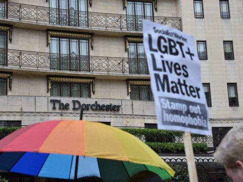 Protestors outside The Dorchester hotel on Park Lane, London demonstrating against the Brunei anti-gay laws.