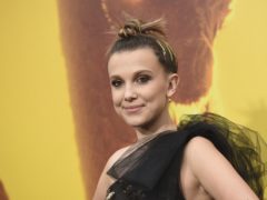 Stranger Things star Millie Bobby Brown has opened up on how bullies forced her to switch schools (Chris Pizzello/Invision/AP)