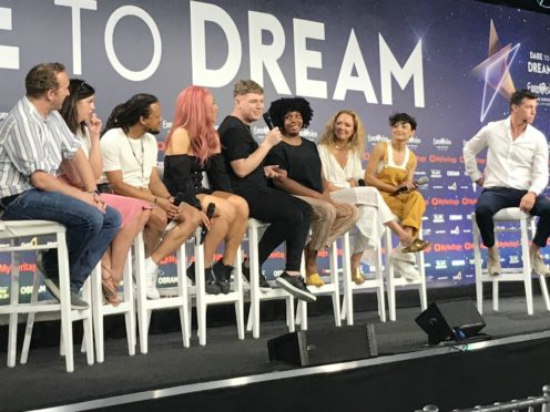 UK entry Michael Rice with his team in Tel Aviv, Israel (Alex Green/PA)