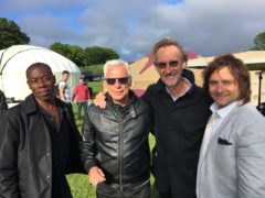 Andrew Roachford, left, with Mike + the Mechanics and Isle of Wight Festival promoter John Giddings (Ben Mitchell/PA)