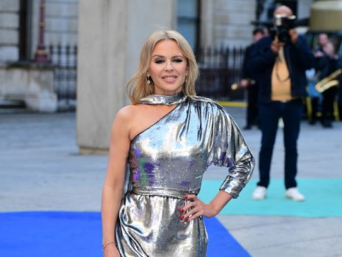 Kylie Minogue has admitted she will shed a tear on stage at Glastonbury 14 years after breast cancer deied her a headline slot (Ian West/PA)