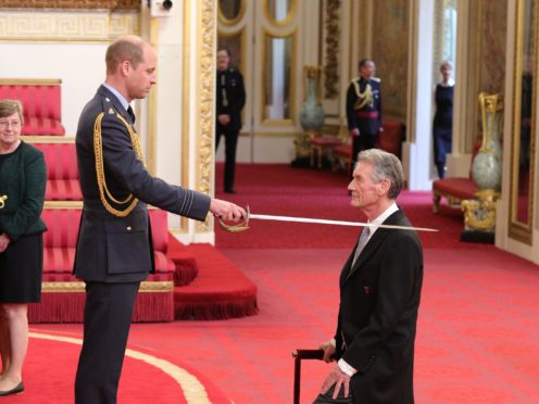 Sir Michael Palin is made a Knight Commander of the Order of St Michael and St George by the Duke of Cambridge (Yui Mok/PA)