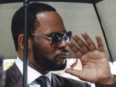 R Kelly leaves court after a hearing (AP Photo/Amr Alfiky)
