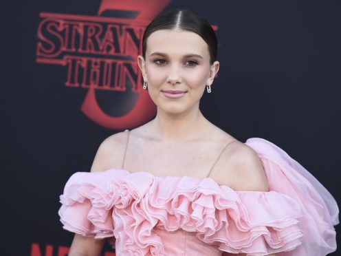 Stranger Things season three, starring Millie Bobby Brown, has achieved a record-breaking start on Netflix (Jordan Strauss/Invision/AP)