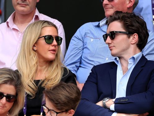 Ellie Goulding and Caspar Jopling watch the centre court action on day eight of the Wimbledon Championships (Mike Egerton/PA)