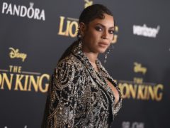 Beyonce Knowles-Carter and daughter Blue Ivy wore matching outfits as they walked the red carpet for The Lion King remake (Jordan Strauss/Invision/AP)