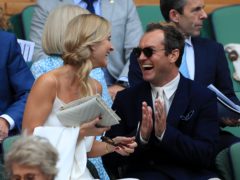 Jude Law with and his wife Phillipa on day 11 of the Wimbledon Championships (Mike Egerton/PA)