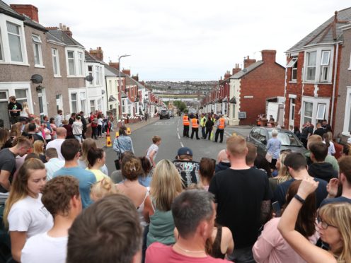 Crowds gather to watch filming for the Gavin and Stacey Christmas special at Barry in the Vale of Glamorgan, Wales (Andrew Matthews/PA)