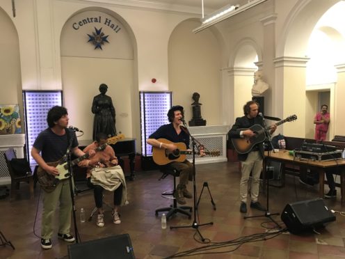 Mystery Jets playing to patients, doctors and nurses at St Thomas’ Hospital in London (Alex Green/PA)