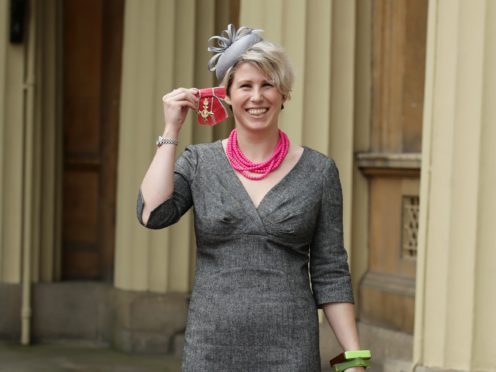 Caroline Criado-Perez at Buckingham Palace after she was made an OBE by the Prince of Wales (Yui Mok/PA)