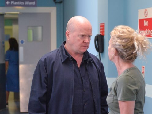 Steve McFadden as Phil Mitchell and Lucy Benjamin as Lisa Fowler in EastEnders (Duncan Ireland/BBC/PA)