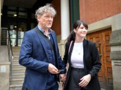 Emmerdale actor Mark Jordon, 54, and partner Laura Norton at Manchester Minshull Street Crown Court, where he was found not guilty on all charges (Jacob King/PA)