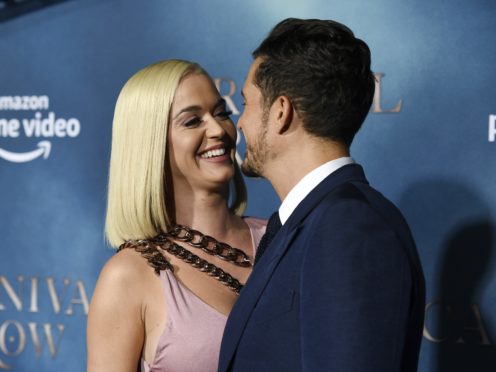 Katy Perry and Orlando Bloom in steamy red carpet PDA (Chris Pizzello/AP)