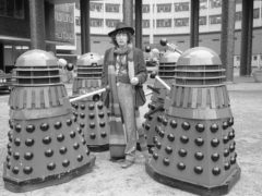Tom Baker as Doctor Who, surrounded by Daleks (BBC)