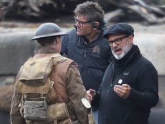 Director Sam Mendes and George MacKay on the set of 1917 at Govan Docks in Glasgow (Andrew Milligan/PA)
