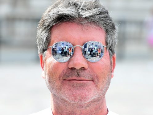 Simon Cowell has commented on his use of facial fillers (Ian West/PA)