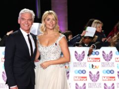 Phillip Schofield and Holly Willoughby will return as presenters of Dancing On Ice (PA)