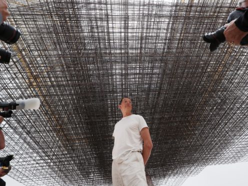 Sculptor Antony Gormley poses with his installation Matrix III (2019) (Yui Mok/PA)