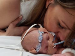 Mum Jenny with tiny Holly Hutchinson while she was in hospital (Sick Children’s Trust/PA)