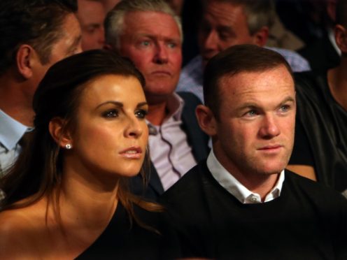 Wayne Rooney and Coleen at Manchester Arena (Richard Sellers/PA)