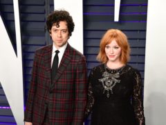Mad Men star Christina Hendricks has announced she has split from her husband of 10 years (Ian West/PA)