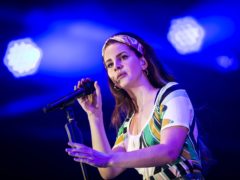 Lana Del Rey has said she is gaining creatively from the cultural ‘damage’ of Donald Trump’s presidency (Danny Lawson/PA)