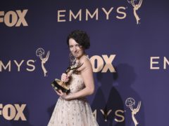 Phoebe Waller-Bridge refuses to put down her newly won Emmy Awards in a teaser for her Saturday Night Live hosting debut (Jordan Strauss/Invision/AP)