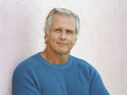 Former Tarzan actor Ron Ely during an interview in 1987 (Reed Saxon/AP)