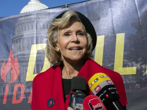 Jane Fonda accepted a prestigious award from Bafta Los Angeles while being led away in handcuffs after being arrested during climate change protests (AP Photo/Manuel Balce Ceneta)