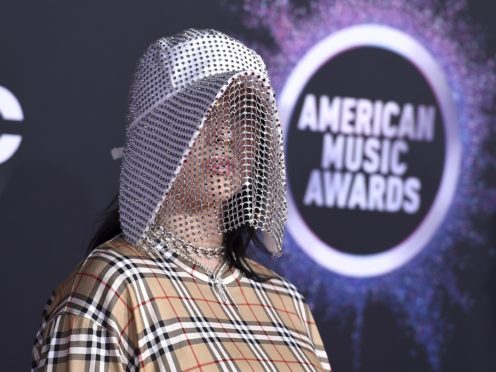 Teenager Billie Eilish kicked off the American Music Awards by picking up the first award of the night (Jordan Strauss/Invision/AP)