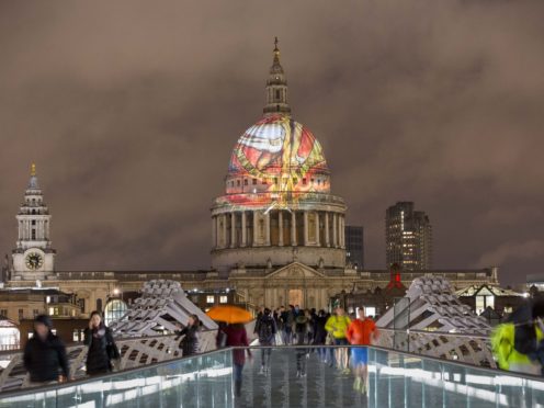 William Blake’s final masterpiece ‘The Ancient Of Days’ is projected onto the dome of St Paul’s Cathedral (Rick Findler/PA)