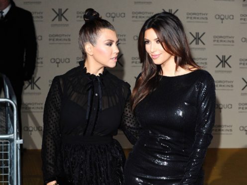 Kourtney Kardashian and Kim Kardashian (Ian West/PA)