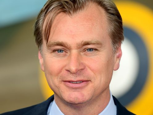 Christopher Nolan was awarded a CBE for services to film (Ian West/PA)