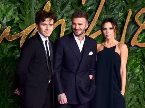 Brooklyn, David and Victoria Beckham (Ian West/PA)