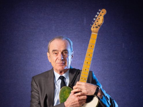 A guitar belonging to Status Quo star Francis Rossi has been sold at auction for nearly £120,000 (Dominic Lipinski/PA)