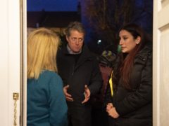 Liberal Democrats candidate for Finchley and Golders Green Luciana Berger, right, and Hugh Grant canvassing in Finchley (David Mirzoeff/PA)
