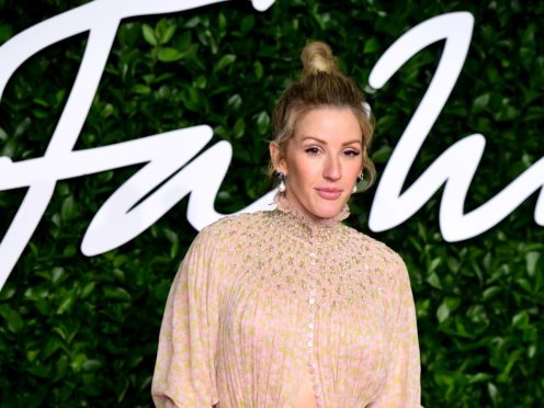 Ellie Goulding has revealed she turned to alcohol in a bid to become ‘more interesting’ as she adjusted to life in the spotlight (Ian West/PA)