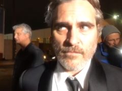 Actor Joaquin Phoenix talks at a pig vigil in Los Angeles (Jane Unchained News)
