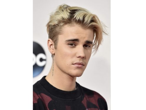 Justin Bieber has revealed he has been diagnosed with Lyme disease (AP Photo by Jordan Strauss/Invision/AP)