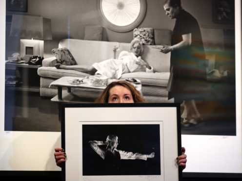 Photographs of David Bowie and Marilyn Monroe are among the auction items (Andrew Milligan/PA)