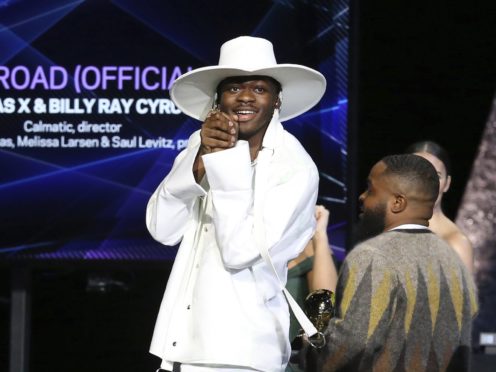 Lil Nas X accepts the award for best music video for Old Town Road (Matt Sayles/AP/PA)