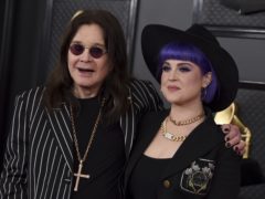 Ozzy Osbourne walked the red carpet at the 62nd Grammy Awards with the aid of a cane (Jordan Strauss/Invision/AP)