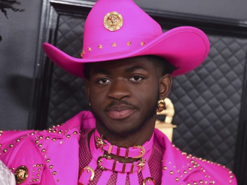 Lil Nas X arrives at the 62nd annual Grammy Awards (Jordan Strauss/Invision/AP)