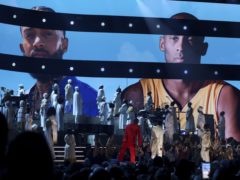 Nipsey Hussle and Kobe Bryant appear on the big screens during a tribute at the 62nd annual Grammy Awards (Matt Sayles/Invision/AP/PA))
