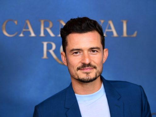 Orlando Bloom has fixed his tattoo which had his son’s name spelt wrong (Ian West/PA)